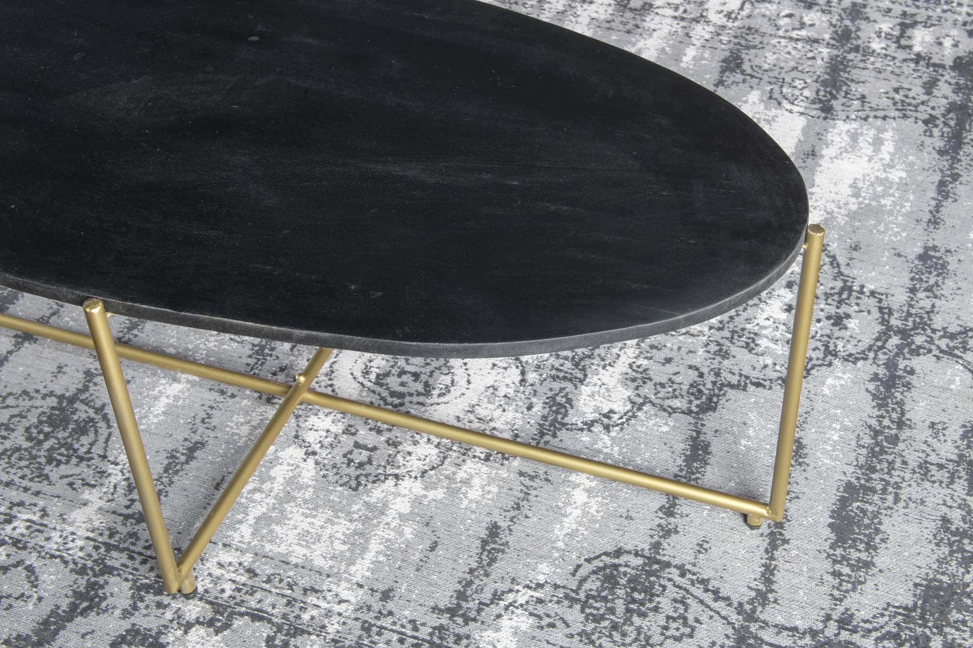 Couchtisch Anthony oval 110 x 40 cm Mangholz schwarz gold