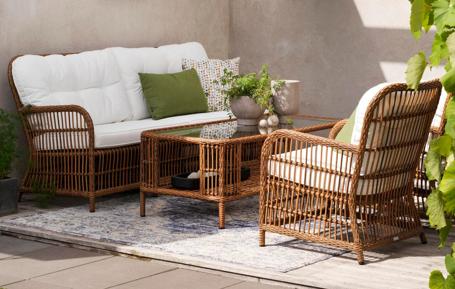 Garten Couchtisch Anemon 140 x 65 cm Polyrattan mit Glasplatte